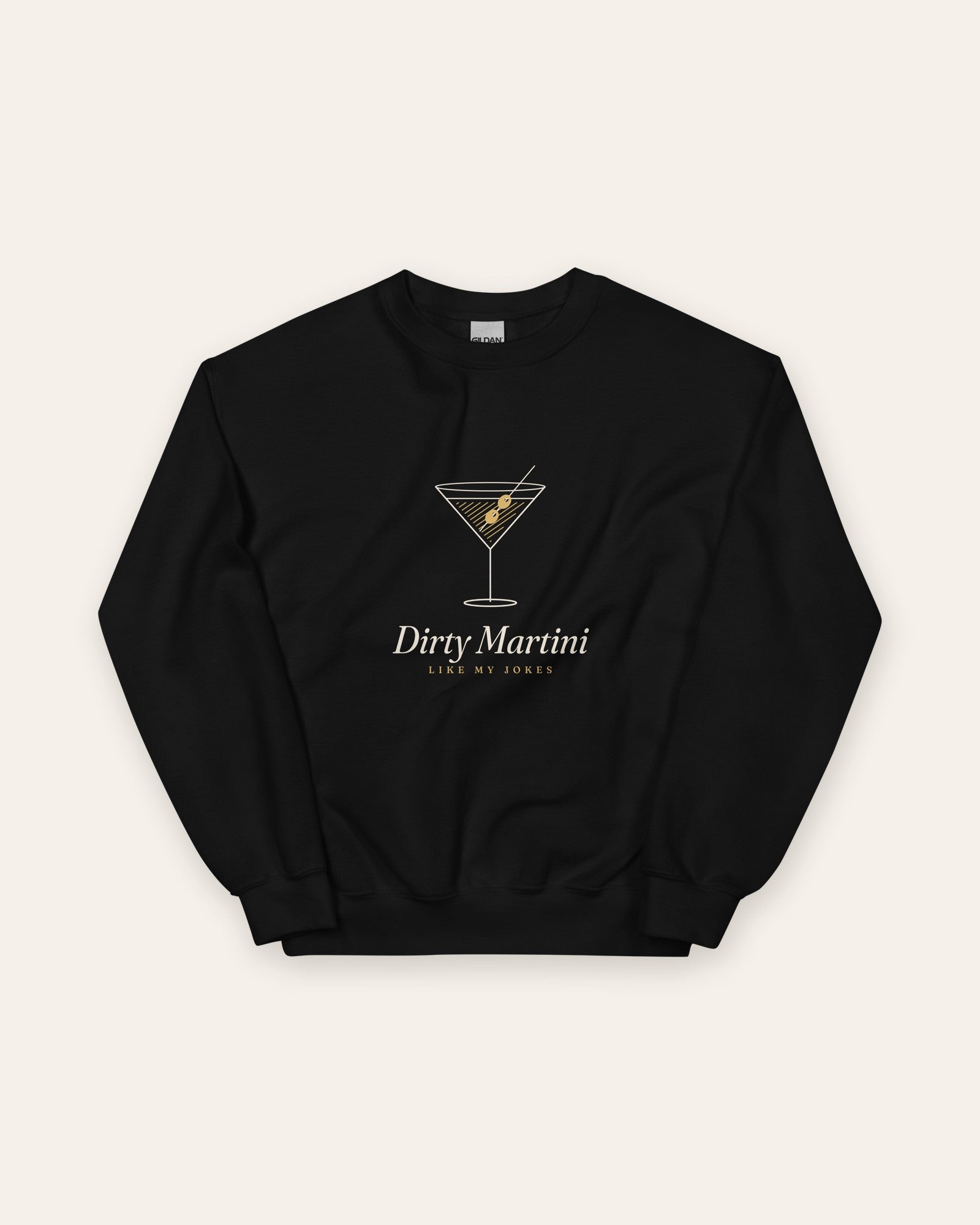 The Dirty Martini Crewneck in Black, flat lay front, product shot on cream