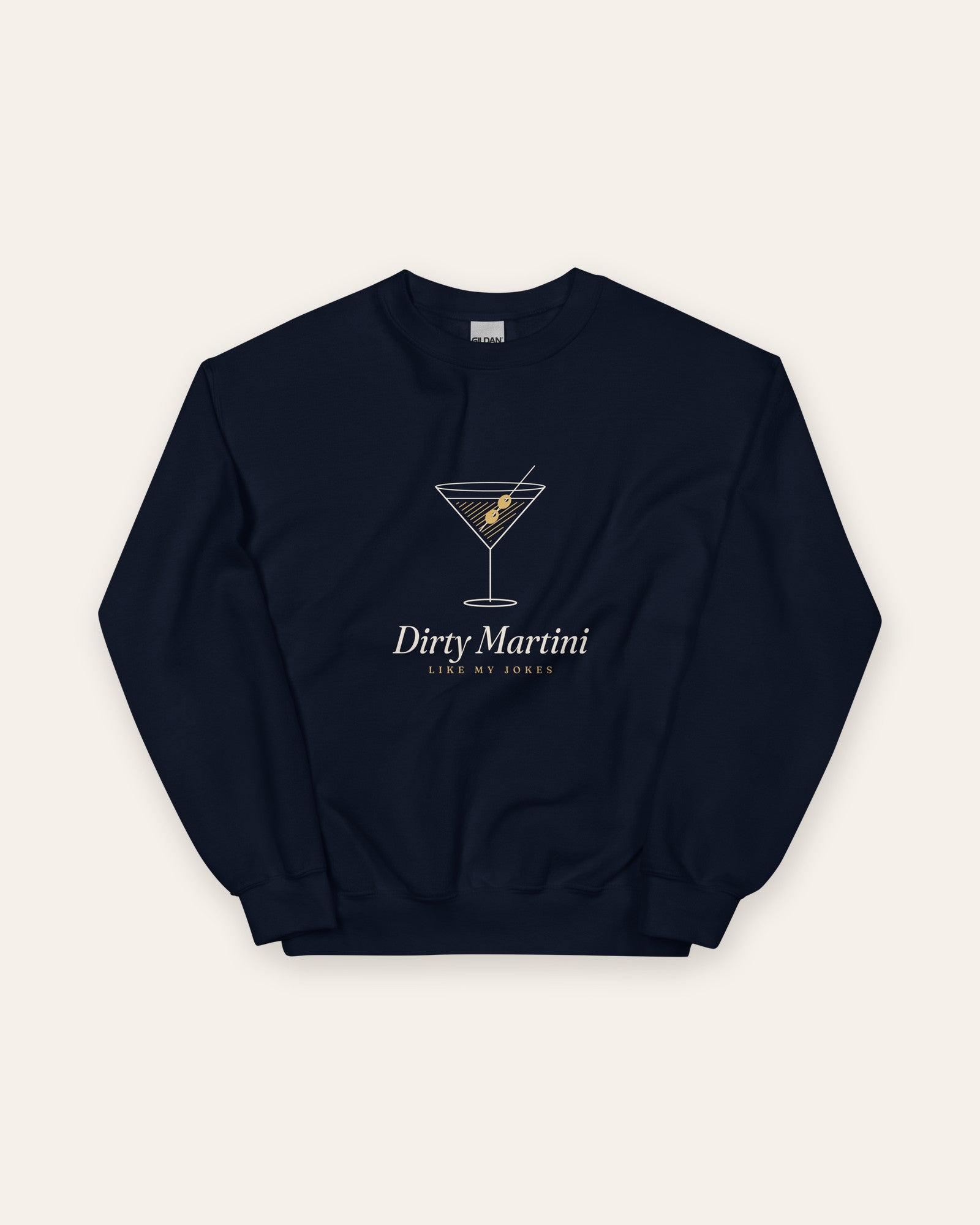 The Dirty Martini Crewneck in Navy, flat lay front, product shot on cream