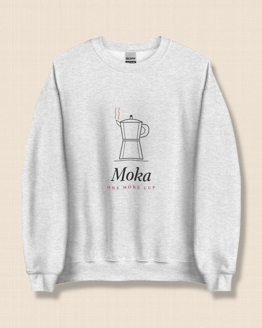 The Moka Crewneck in Ash, flat lay on linen