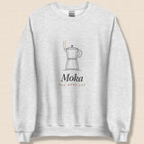 The Moka Crewneck in Ash, flat lay on linen