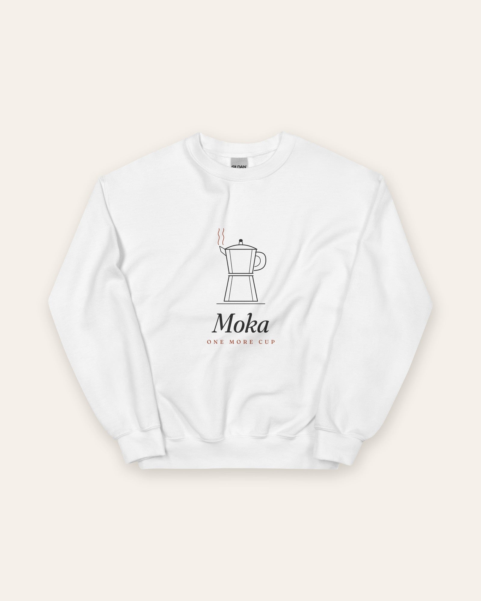 The Moka Crewneck in White, flat lay front, product shot on cream