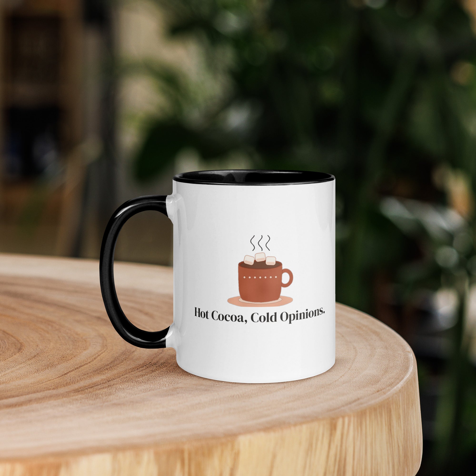 The mug on a round wooden side table
