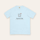 The Negroni Club Tee in Chambray, flat lay front, product shot on cream