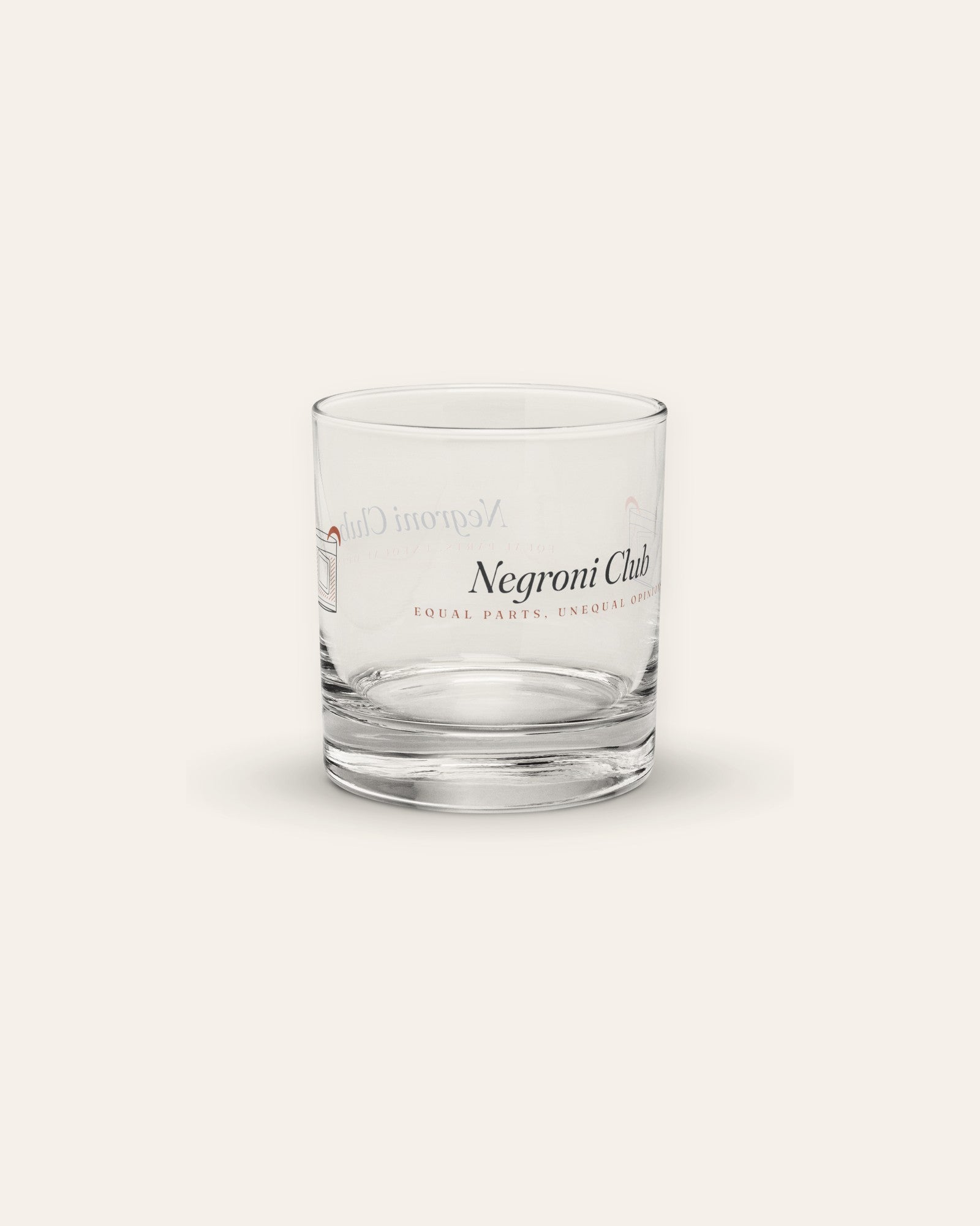 The Negroni Club Rocks Glass, product shot on cream