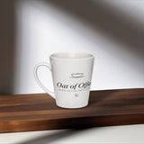The Oat of Office Latte Mug in White, styled lifestyle shot