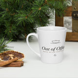 The Oat of Office Latte Mug in White, styled lifestyle shot