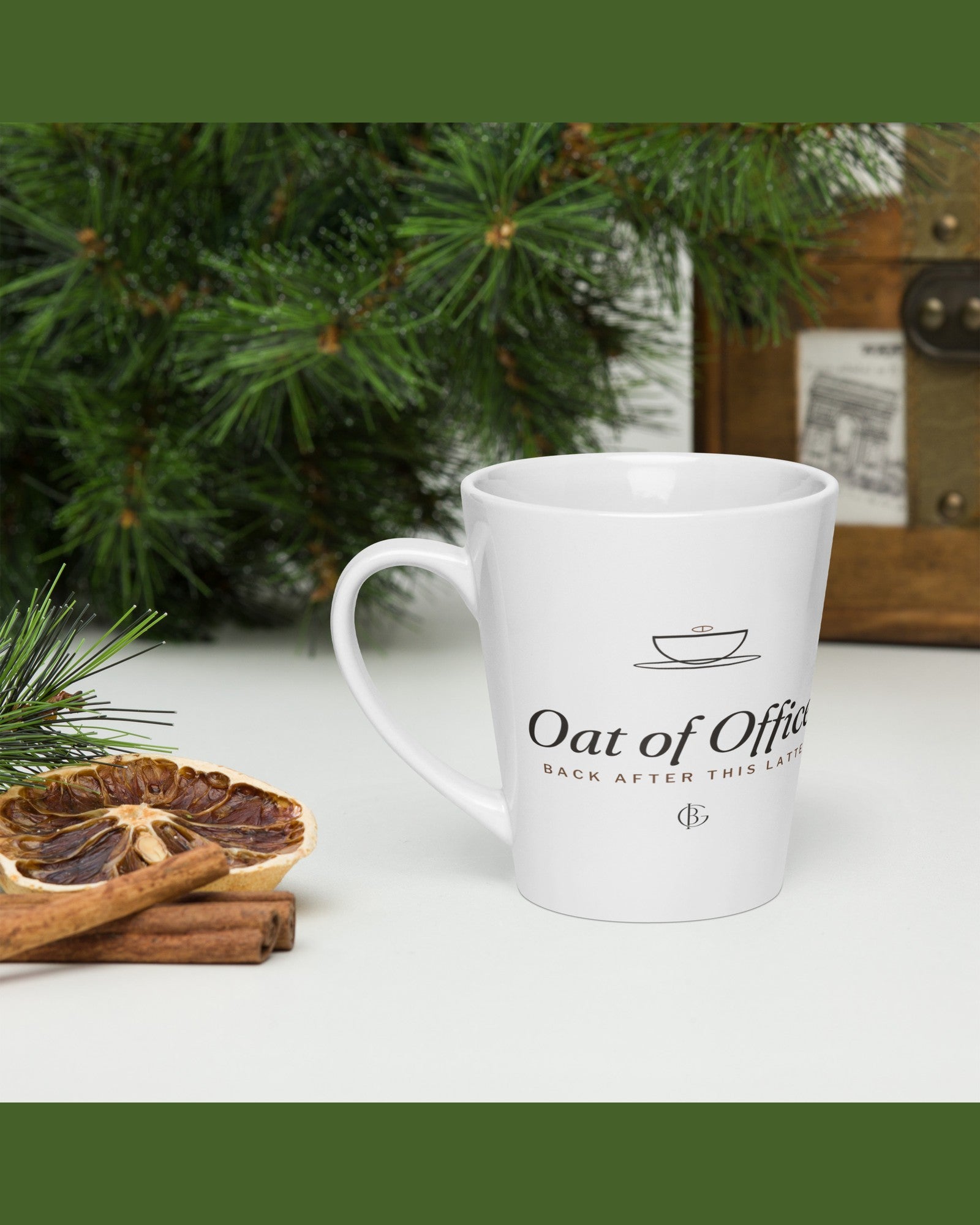 The Oat of Office Latte Mug in White, styled lifestyle shot