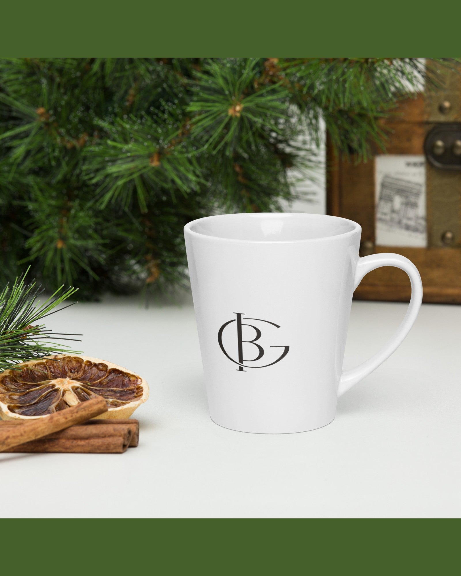 The Oat of Office Latte Mug in White, styled lifestyle shot