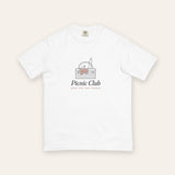 The Picnic Club Tee in White, flat lay front, product shot on cream