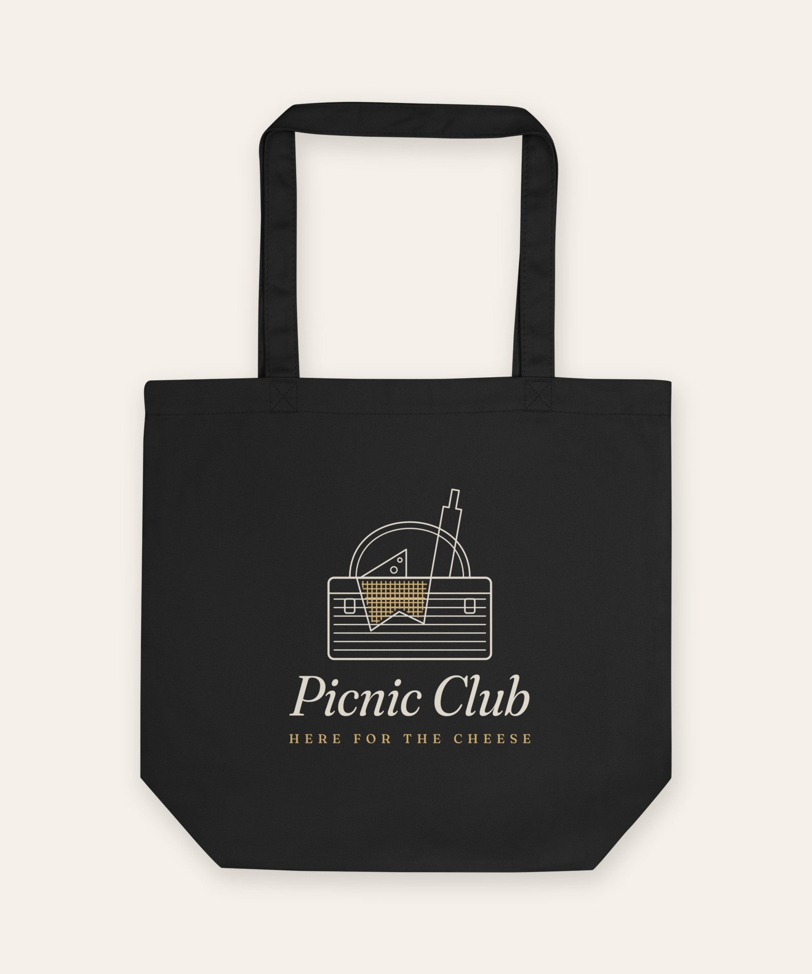 The Picnic Club Tote in Black, flat lay front, product shot on cream