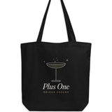 The Plus One Tote in Black, flat lay front, product shot on cream