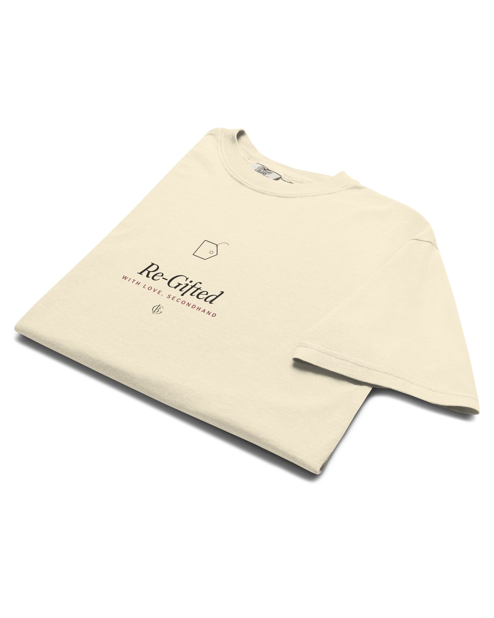 The Re-Gifted Tee in Ivory, neatly folded