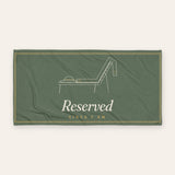 The Reserved Beach Towel, product shot on cream