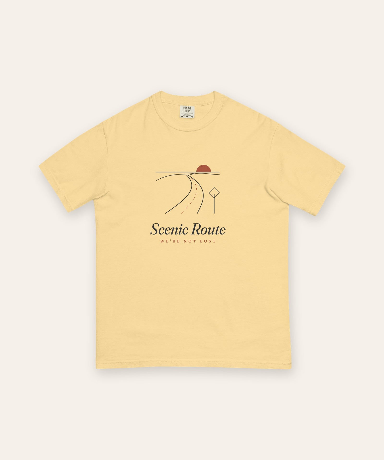 The Scenic Route Tee in Butter, flat lay front, product shot on cream