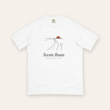 The Scenic Route Tee in White, flat lay front, product shot on cream