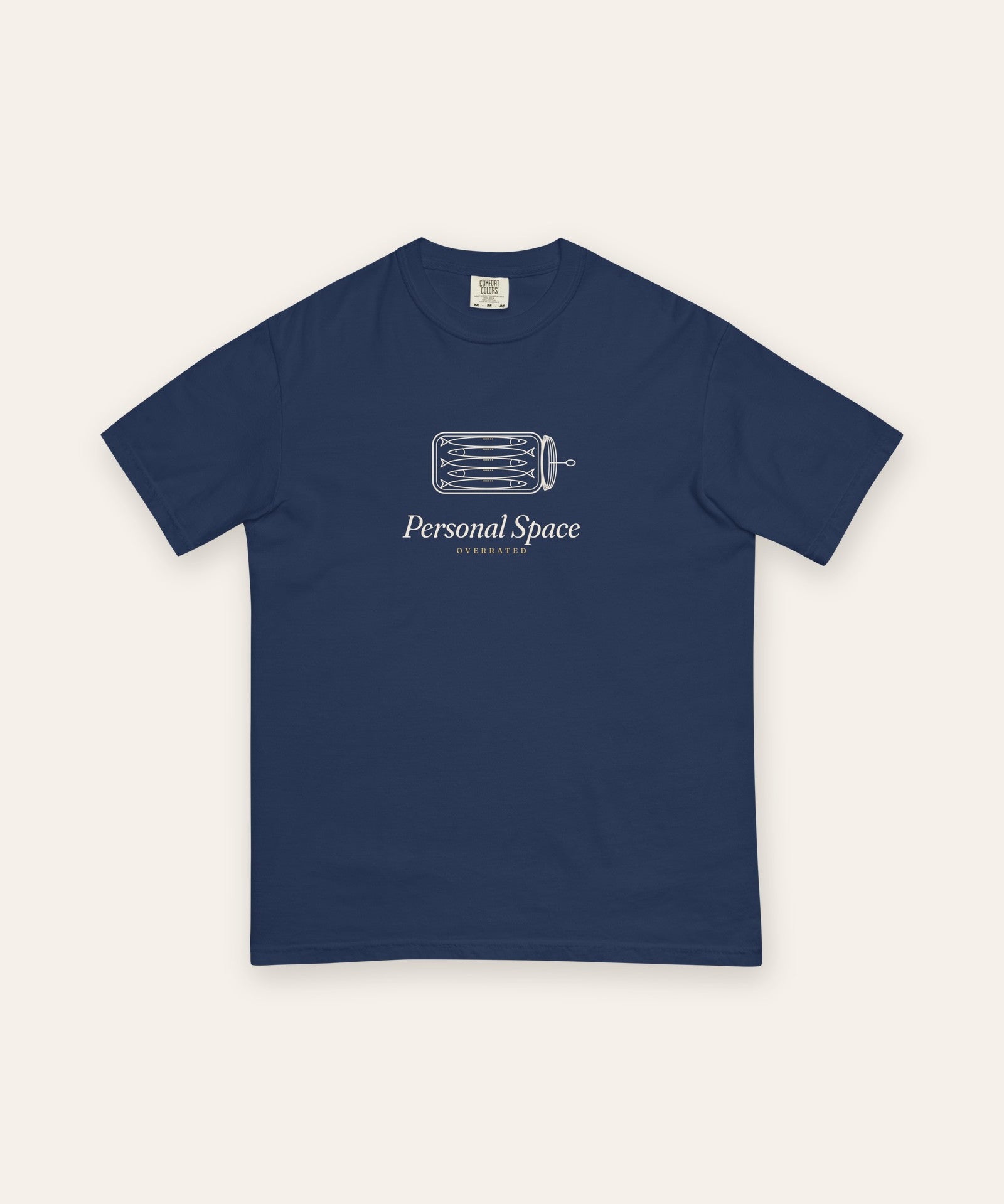 The Personal Space Tee in True Navy, flat lay front, product shot on cream