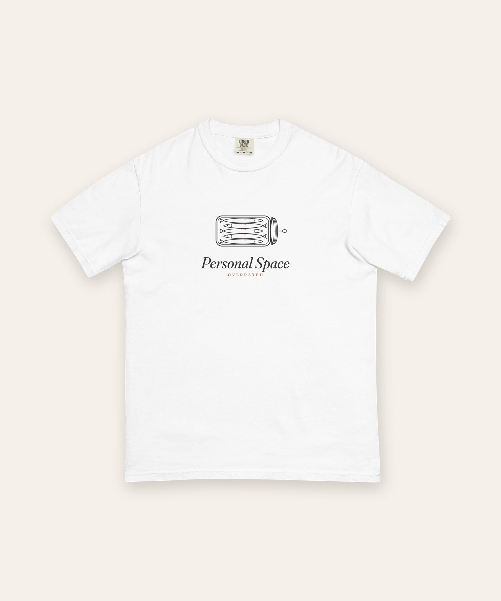 The Personal Space Tee in White, flat lay front, product shot on cream