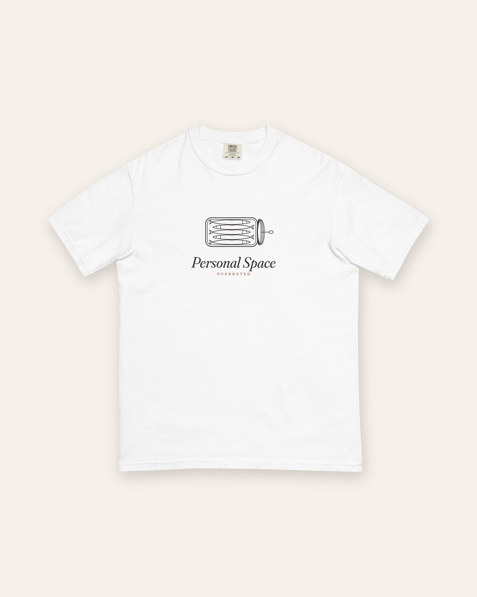 The Personal Space Tee in White, flat lay front, product shot on cream