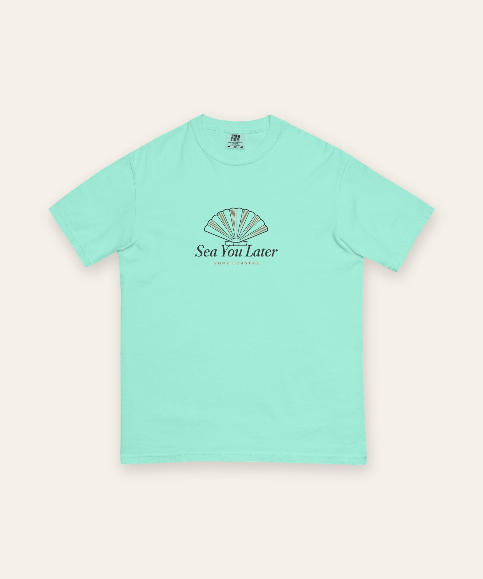 The Sea You Later Tee in Chalky Mint, flat lay front, product shot on cream