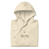 The Slow Drip Hoodie in Bone, neatly folded