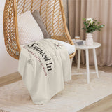 The Snowed In Sherpa Blanket in Tan, styled lifestyle shot