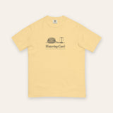 The Watering Can't Tee in Butter, flat lay front, product shot on cream