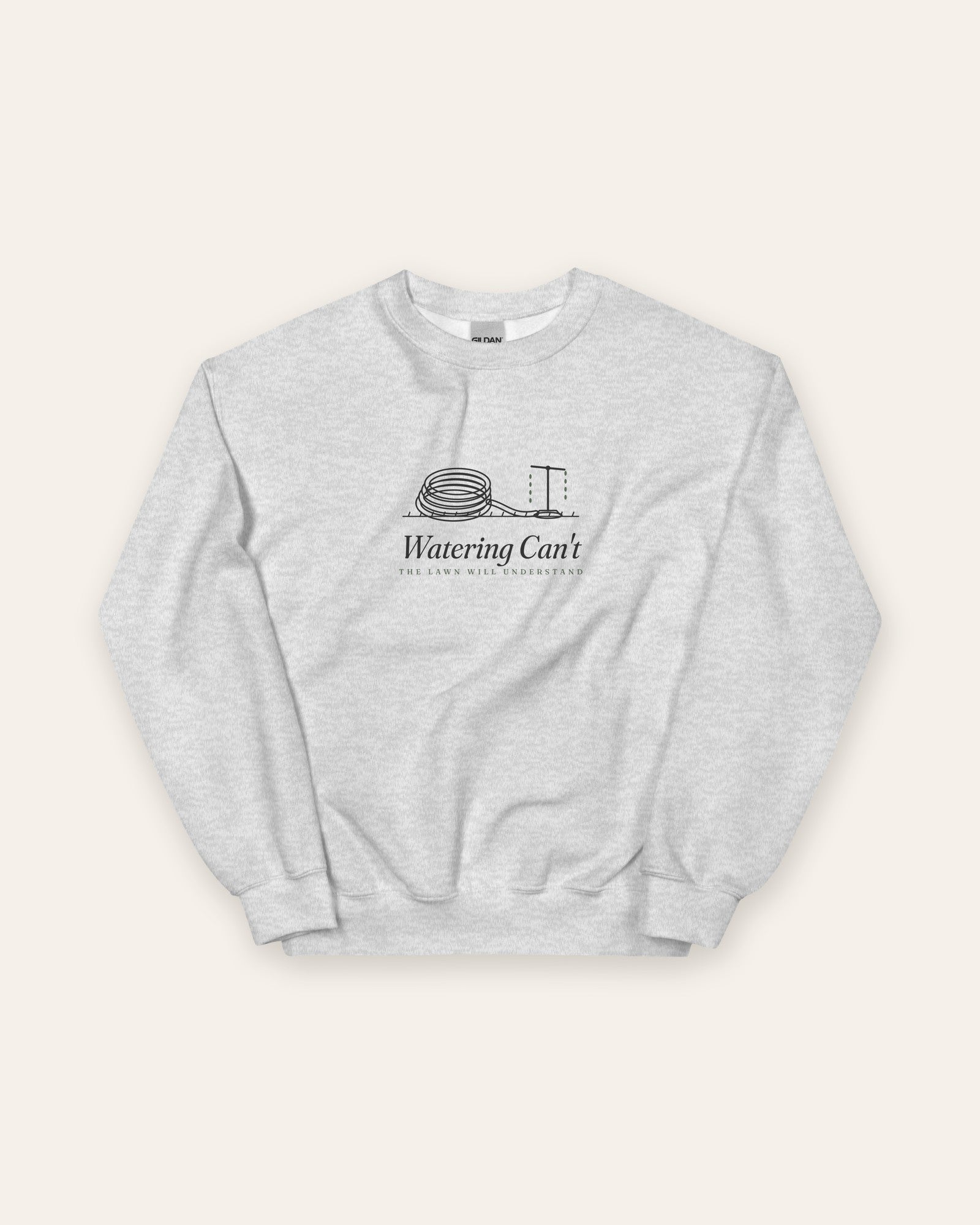The Watering Can't Crewneck in Ash, flat lay front, product shot on cream