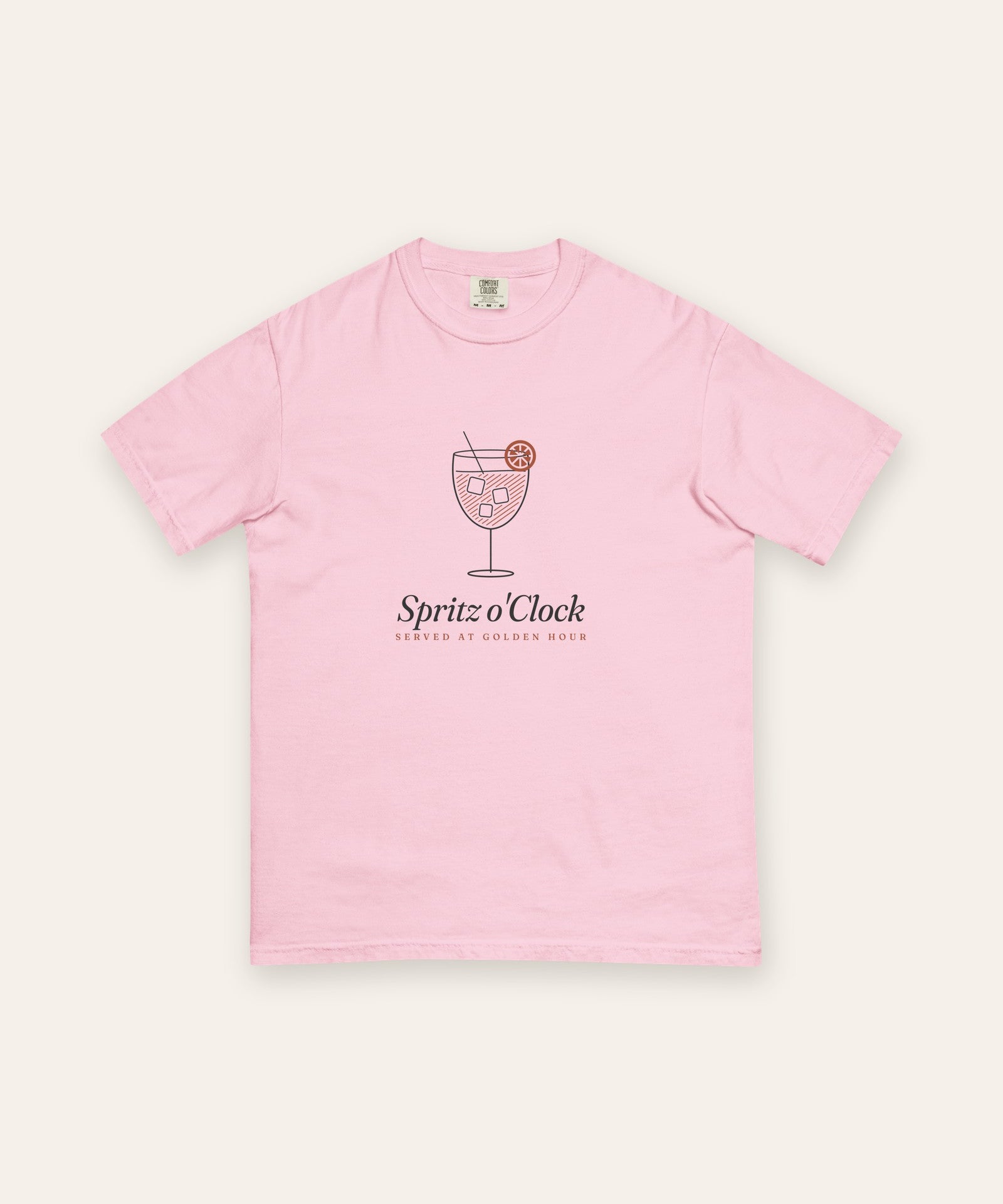 The Spritz o'Clock Tee in Blossom, flat lay front, product shot on cream