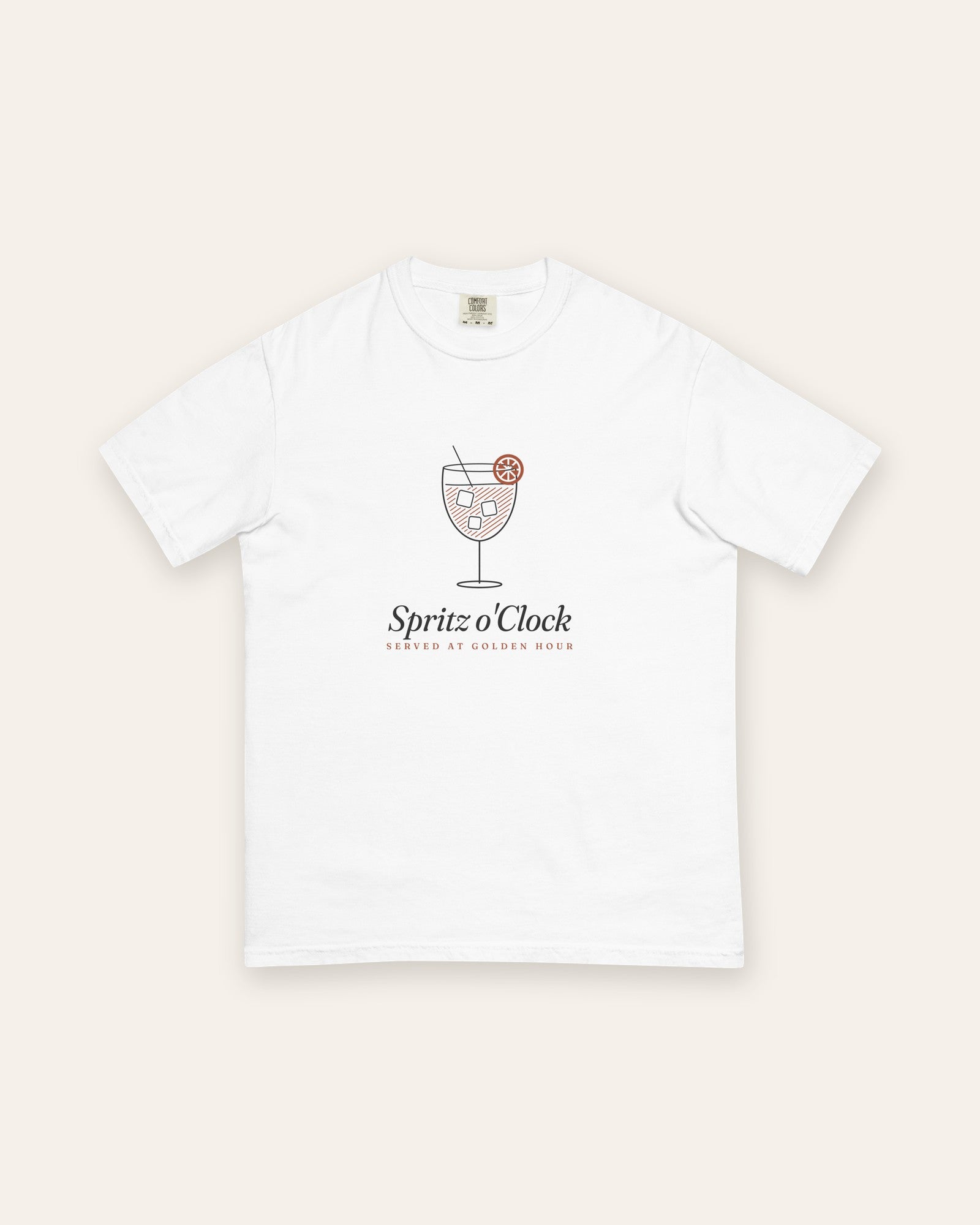 The Spritz o'Clock Tee in White, flat lay front, product shot on cream