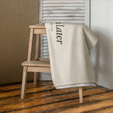 The Towel You Later Beach Towel in White, styled lifestyle shot