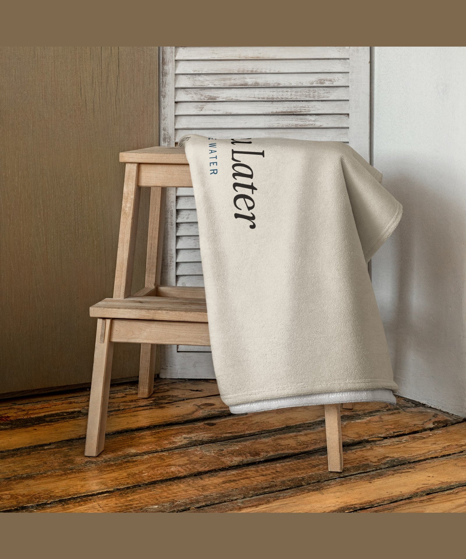 The Towel You Later Beach Towel in White, styled lifestyle shot