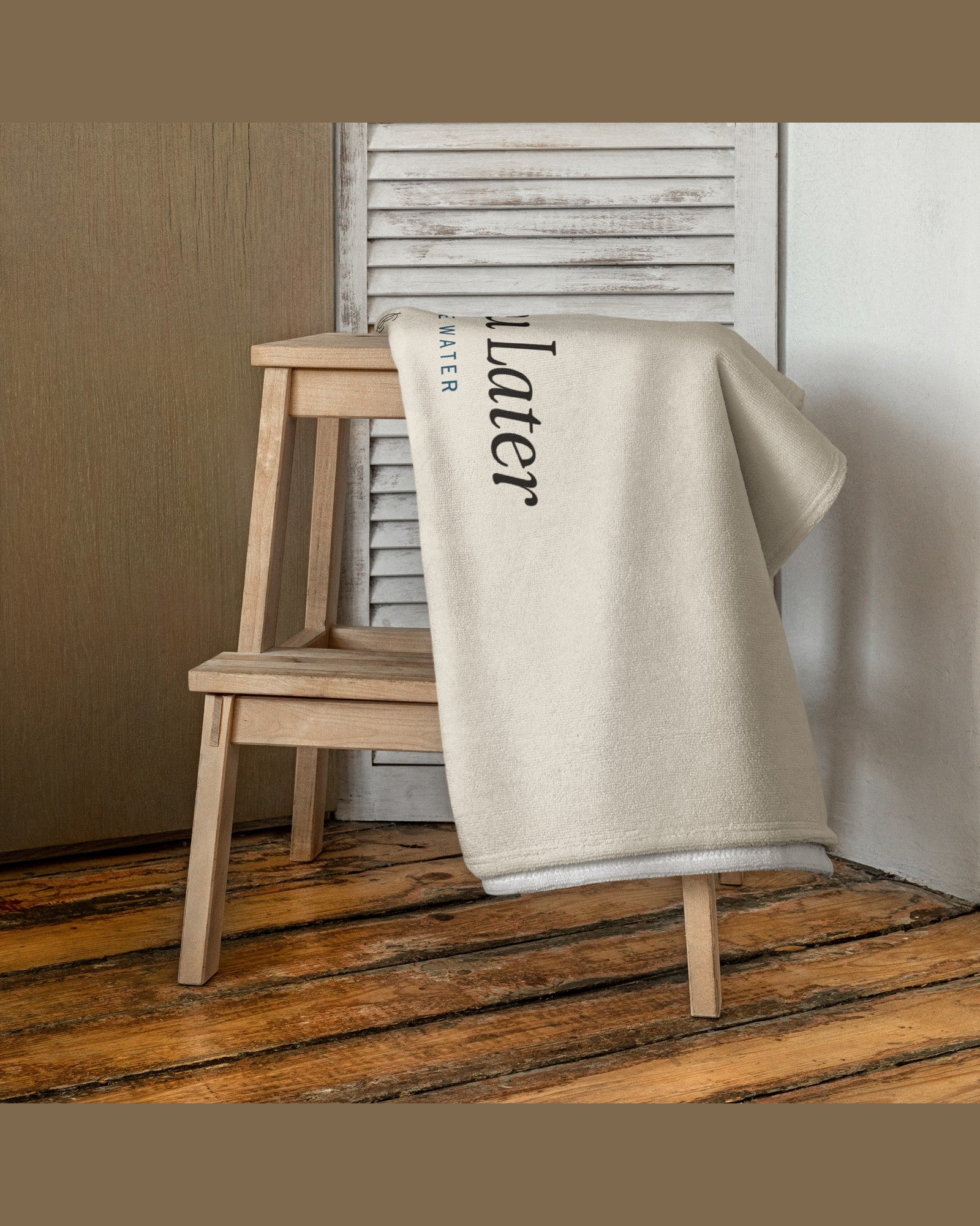 The Towel You Later Beach Towel in White, styled lifestyle shot