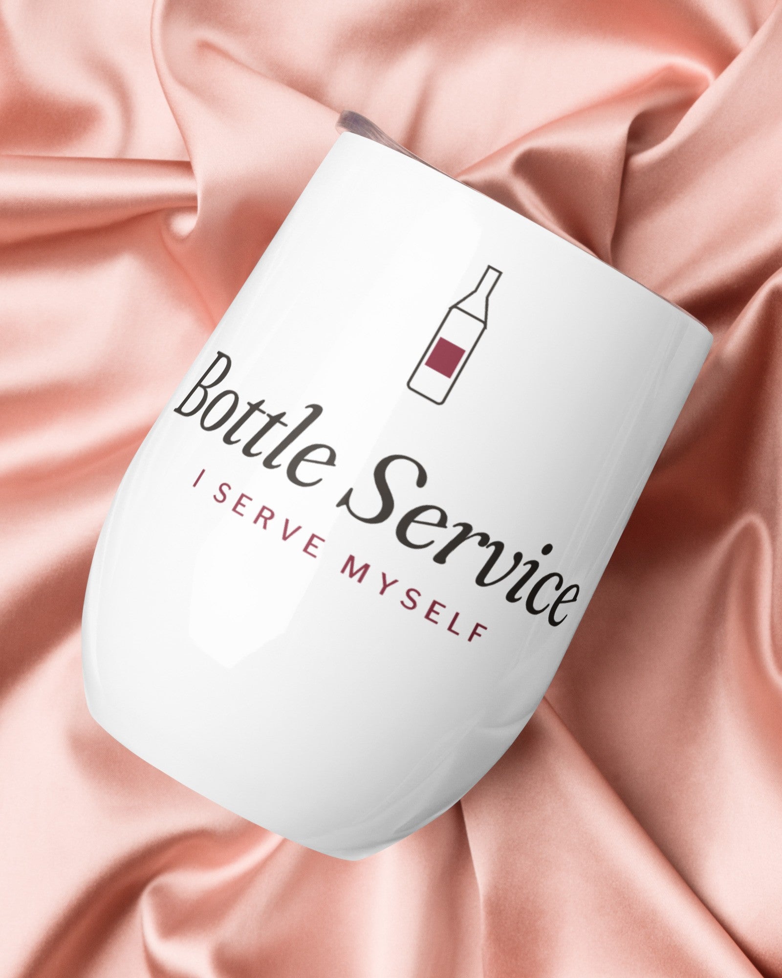 The Bottle Service Wine Tumbler on pink silk