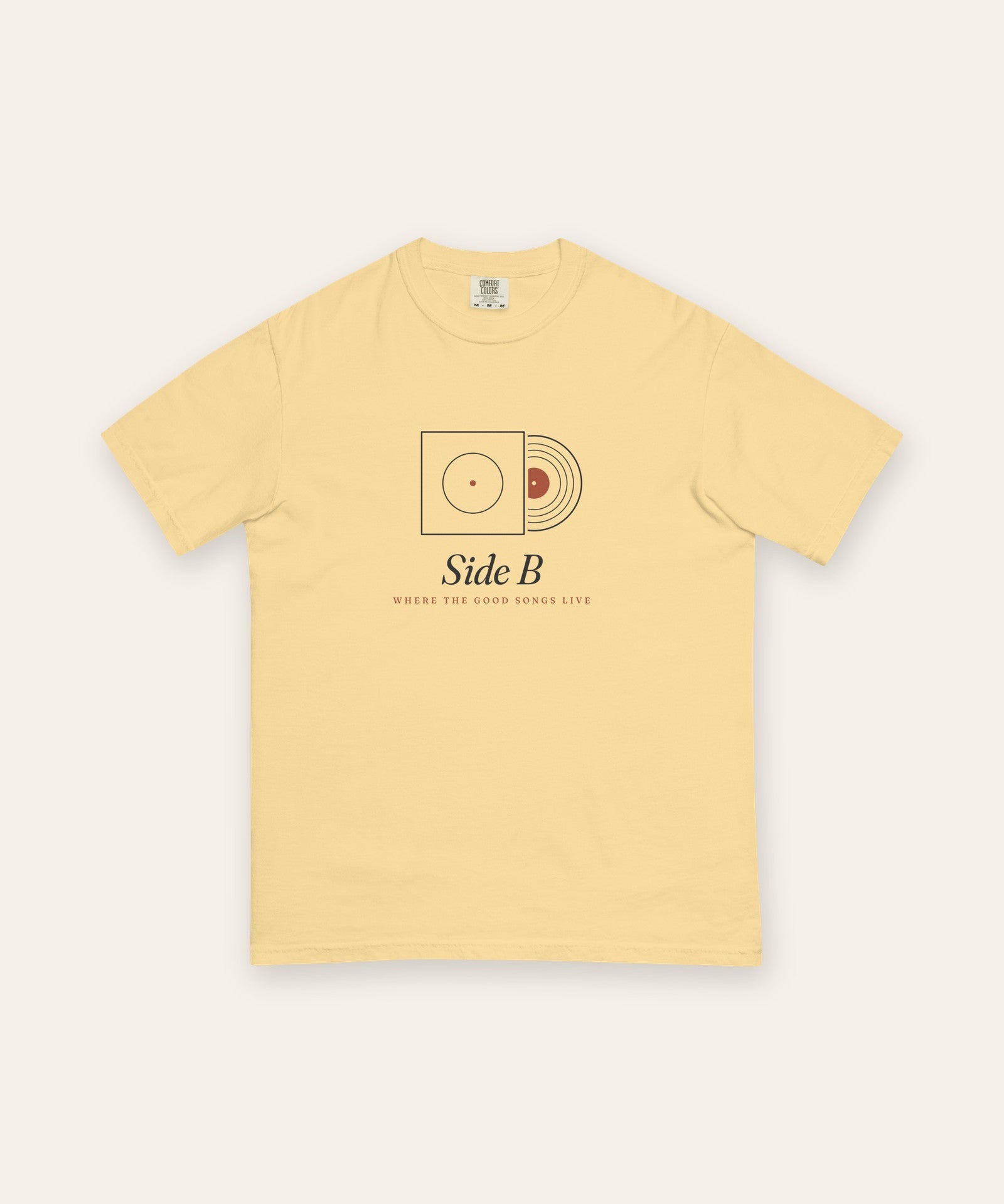 The Side B Tee in Butter, flat lay front, product shot on cream
