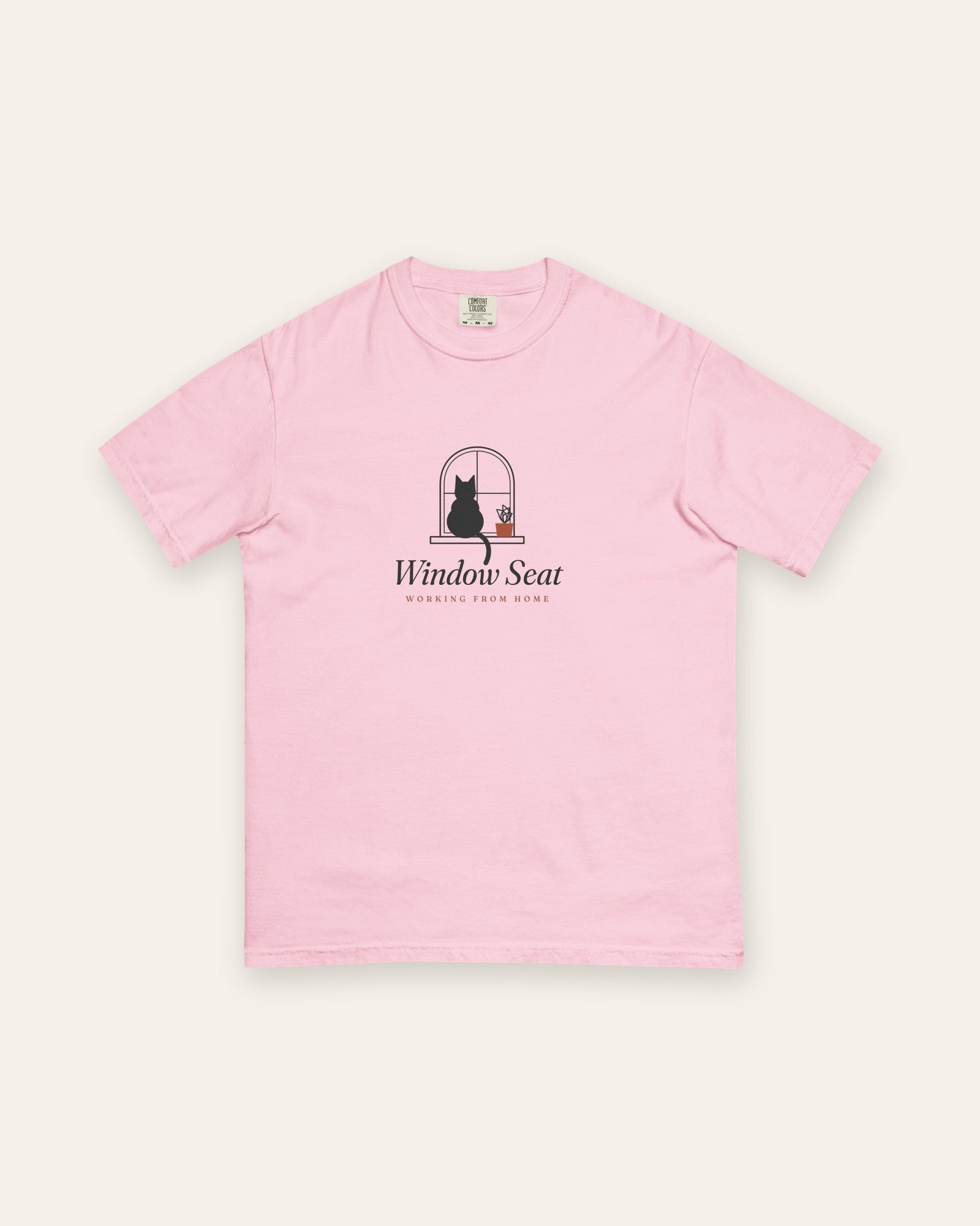 The Window Seat Tee in Blossom, flat lay front, product shot on cream