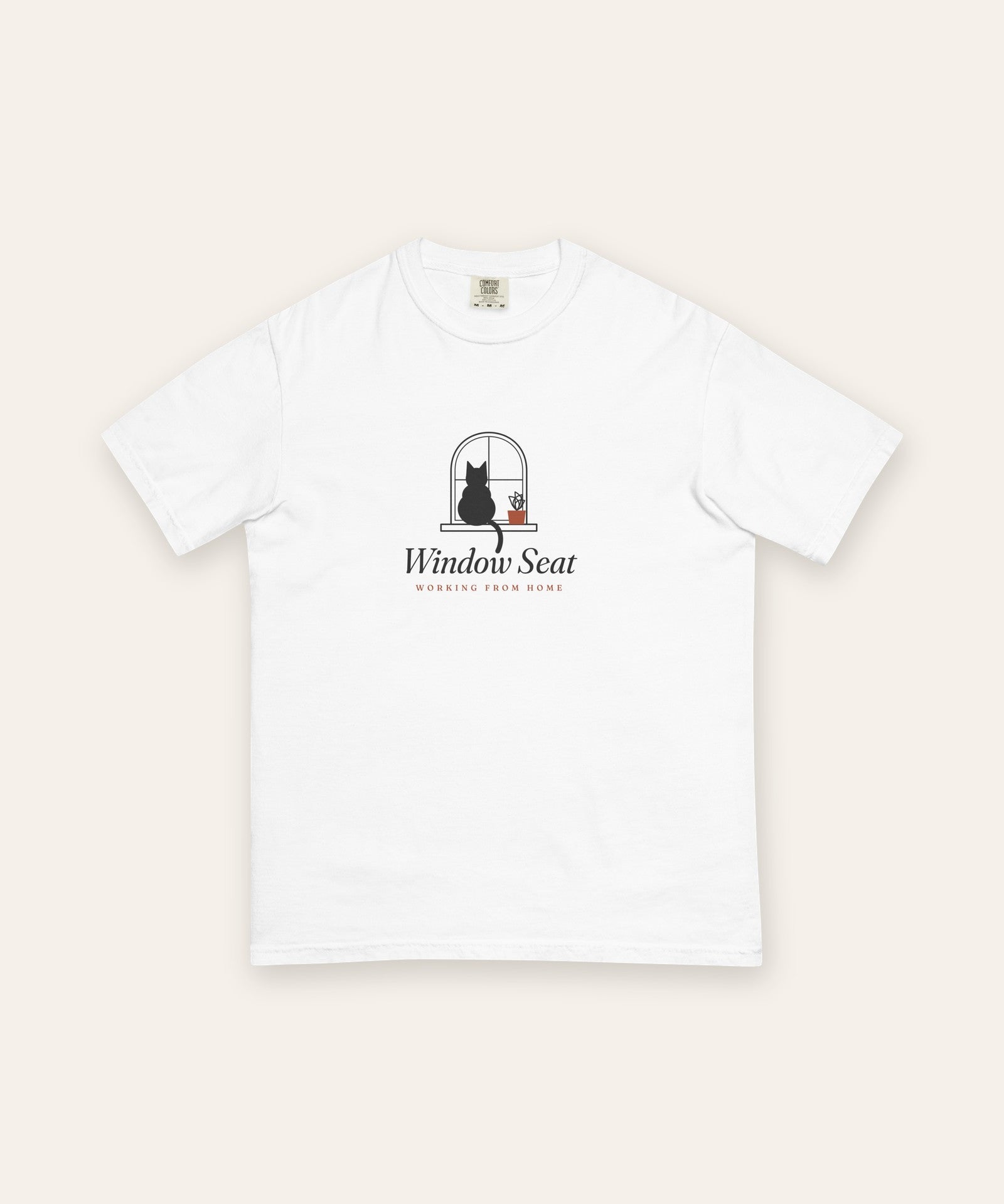 The Window Seat Tee in White, flat lay front, product shot on cream